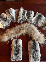 overview of all four fur pieces laid on table
