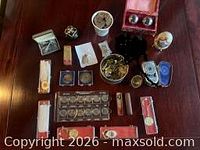 Full layout of coins, Baoding balls, jewellery, egg, lighters