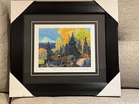 Full view of framed print with corner protectors showing overall presentation
