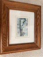 Full view of framed watercolor showing oak frame, mat and artwork