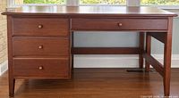 Front view showing drawer layout and overall design