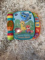 Front cover of VTech Animal Rhymes Music Book closed