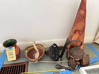 Group shot of all five decorative items lined on floor