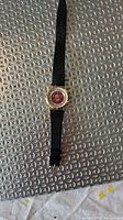 Front view of wristwatch showing dial and strap