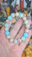 Full bracelet view showing bead colors and elastic construction