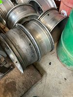stack of aluminum truck wheels