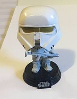 Front view of Range Trooper bobble-head on stand