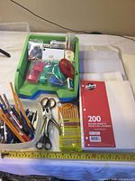 Overall view of lot showing paper pack, organizer tray and writing instruments