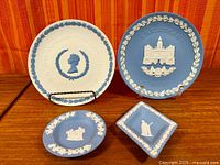 Four Wedgwood Jasperware pieces on table
