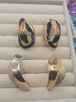Both earring pairs in tray