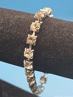 Full view of rhinestone bracelet on display bar