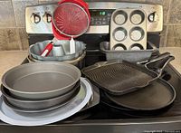 Group shot of all cookware and bakeware on stove