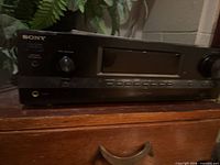 Front view showing Sony logo, display, knobs and buttons