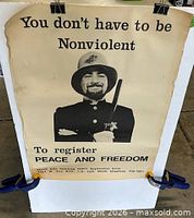 Front view of the unframed political poster showing full artwork, text and wear