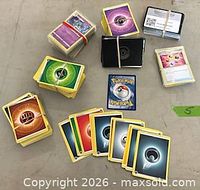 Overview of all rubber-banded card bundles and loose Energy cards