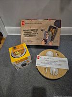 All three boxed items grouped: grill prep set, salad bowl set, lunch crock
