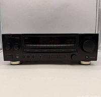 Front view of Kenwood KR-V6060 receiver showing controls and display