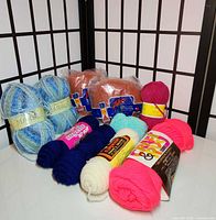 group shot of all yarn skeins on table