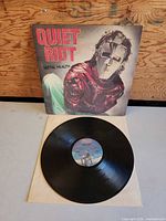 Front jacket showing Quiet Riot Metal Health artwork with record displayed