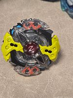 Front view of assembled Galaxy Zeutron Beyblade