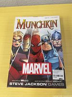 Front of Munchkin Marvel Edition game box