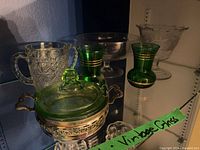 Group shot showing all glassware pieces in cabinet