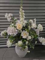 Full view of the floral arrangement and vase