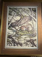 Full view of framed cougar lithograph with mat and frame
