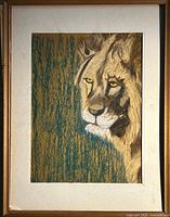 Full framed artwork showing lion drawing with mat and frame