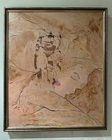 Full view of framed textured painting on wall