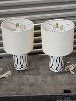 Full view of both lamps with cords visible