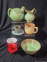 Front view of all seven ceramic pieces