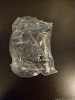Mini bench vise sealed in plastic bag