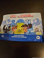 front of sealed Wendy's activity kit showing Art Time Machine branding