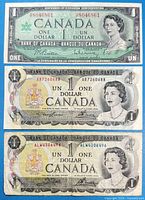 Front view of all three banknotes showing obverse designs and serial numbers