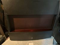 Front of black Bionaire air purifier showing open front panel