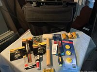 Overall view of entire lot showing bag and packaged tools