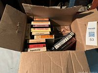 Open box showing numerous 8-track tapes