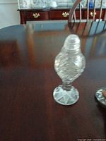 Single cut crystal shaker showing pattern and pedestal base