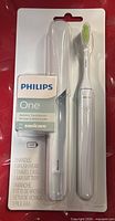 Front view of sealed Philips One toothbrush set