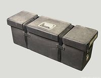 Full view of closed hard plastic case showing three lids and straps