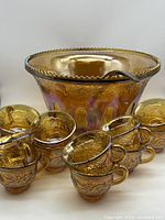 Whole punch set: bowl, ladle, eight cups displayed