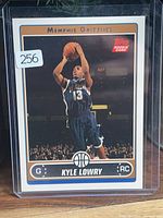 Front of Kyle Lowry Topps rookie card in protective sleeve
