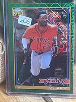 Front view of Topps Chrome Jose Altuve Green Refractor card in holder