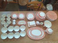 Overhead view of entire china service laid out on table