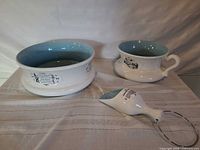 All three ceramic pieces: basin, chamber pot and flask