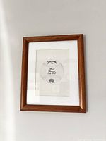 Framed print front view showing image, mat, and frame