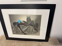 Front view of framed black and white nude photographic print