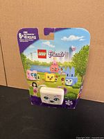 Front view of sealed LEGO Friends Emma's Dalmatian Cube package showing set number, age range and piece count