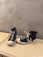 Full view of both sneakers side profile